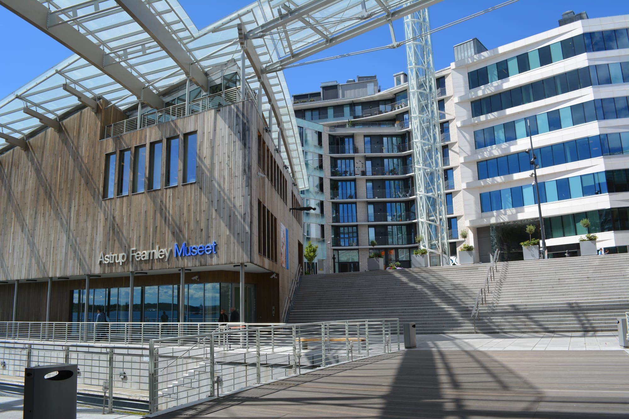 Astrup Fearnley's timber façade beneath its curved glass sail roof