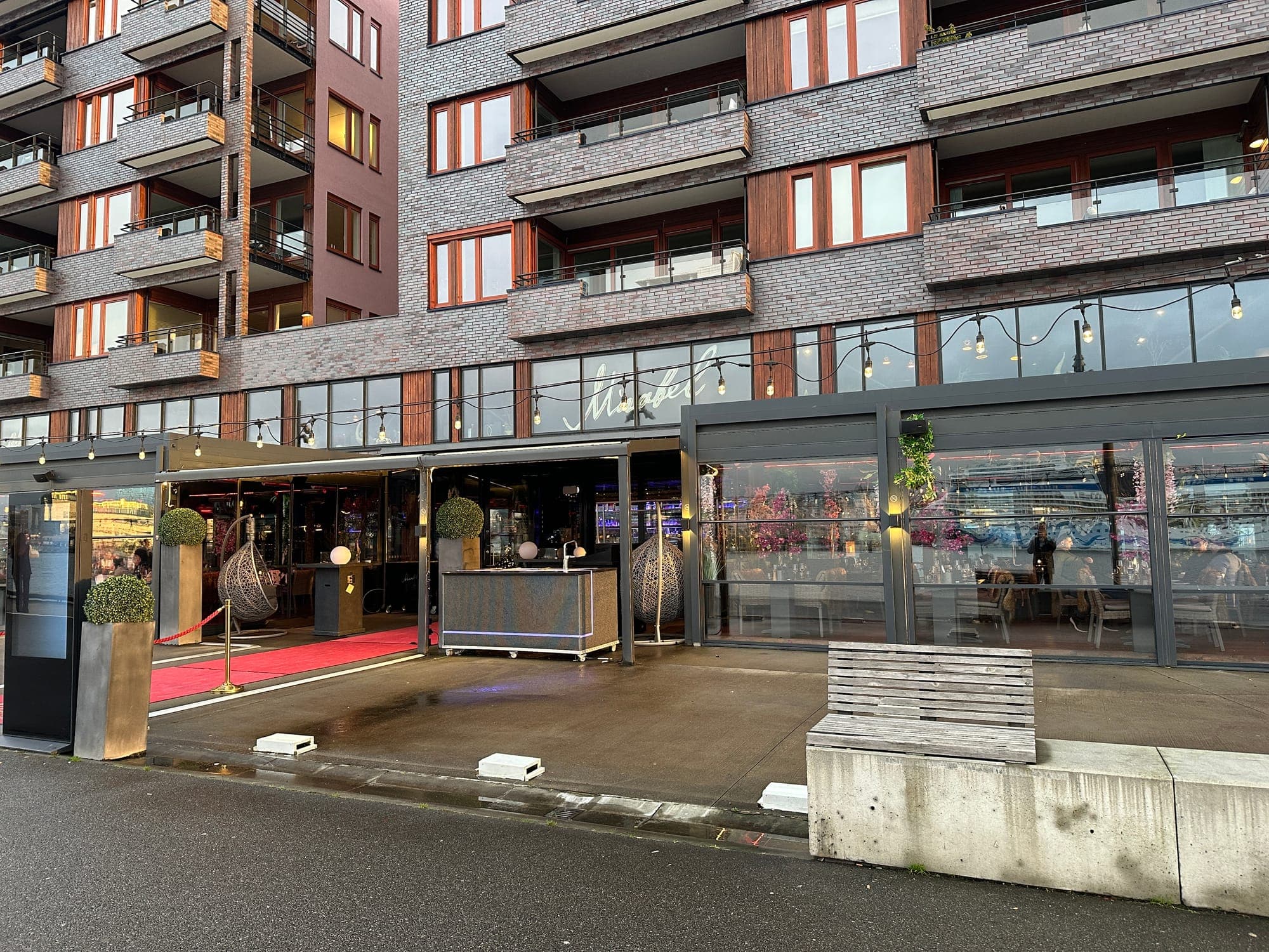 Mirabel's glassed terrace beneath the Sørenga apartment block